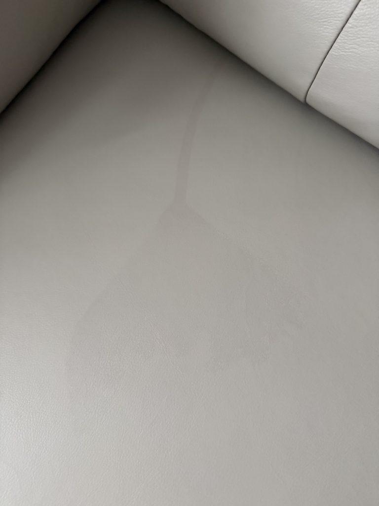 stain on the leather before repair